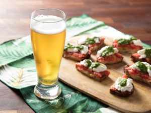 20180913-beer-pairings-crisp-clean-beer-pantry-burrata-tomato-pesto-toast-vicky-wasik-beer-in-glass