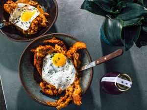 Food at Bearcat in New Orleans: a fried egg on fried crab in a bowl.