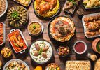 Overhead view of a table full of traditional Ramadan foods.