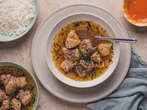 Nigerian pepper soup in a white bowl.