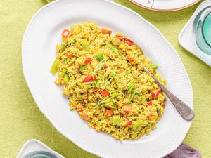 Finished Nigerian fried rice on a serving platter