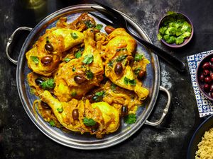 Overhead view of chicken tagine on a platter 