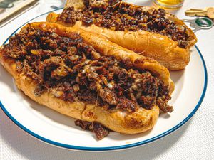 Overhead view of two cheesesteaks