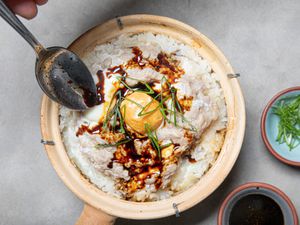 Chinese meatloaf on top of Cantonese clay pot rice.