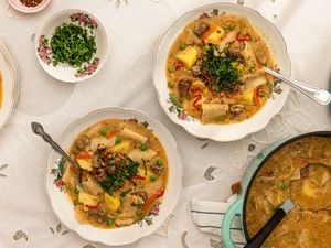 Overhead view of Pantrucas in two serving bowls and pot