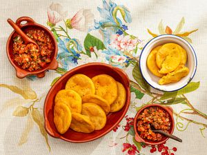 Overhead view of sopaipillas with pebre 