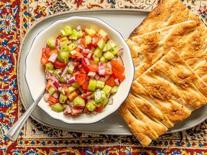 Overhead view of Shirazi salad with bread