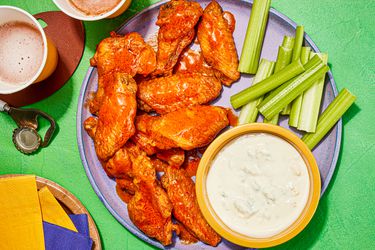 Overhead view of air fryer Buffalo Wings