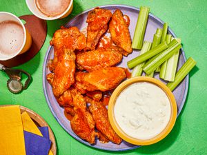 Overhead view of air fryer Buffalo Wings