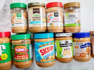 Jars of creamy peanut butter. 