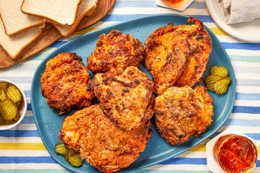 A blue platter with air-fryer fried chicken 