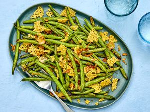 A plate of air-fried green beans with gruyÃ¨re and shallots