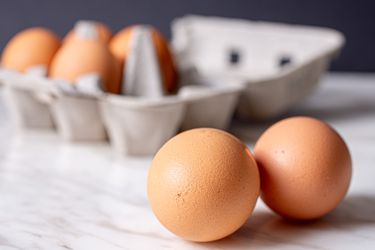 Side view of two eggs