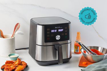 The Instant Pot air fryer on a kitchen countertop.