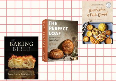 Three cookbooks on a grid background.