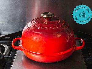 a red Le Creuset bread oven