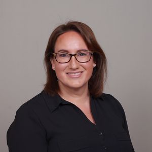 A studio portrait of editor Leah Colins.