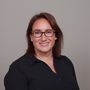 A studio portrait of editor Leah Colins.