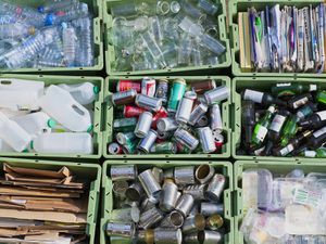 recycling bins with items sorting