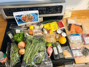 Marley Spoon meal ingredients arranged on a kitchen counter