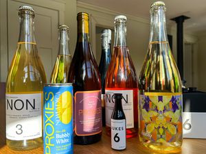 A collection of nonalcoholic wines on a table