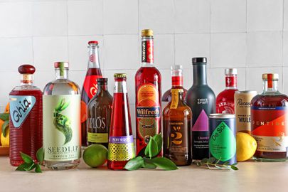 A group of nonalcoholic drinks on a kitchen countertop.