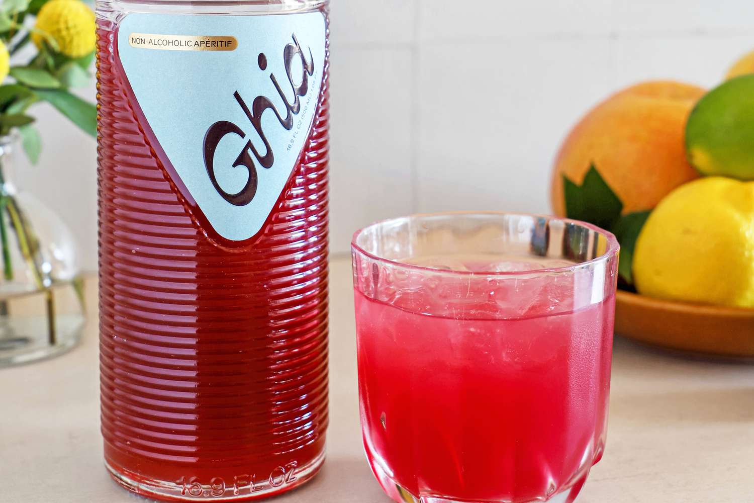 Ghia Nonalcoholic Apéritif in glass on counter