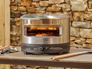 The Solo Stove Pi Prime Pizza Oven cooking a pie