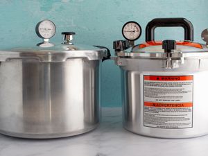 Two Pressure Canners sitting on a counter