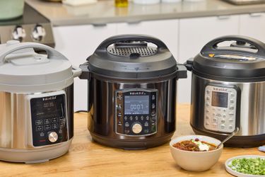 Three Instant Pots on a kitchen countertop.