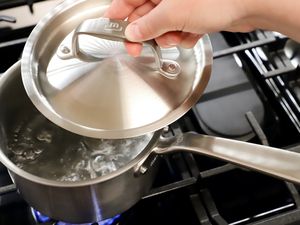 a small saucepan boiling water on a stovetop