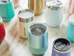 several wine tumblers on a marble surface