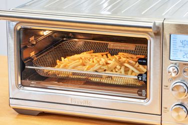 Fries cooking in the Breville the Smart Oven Air Fryer