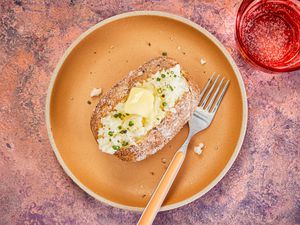 Overhead view of air fryer baked potato