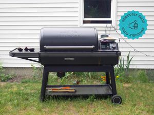 Traeger in front of house