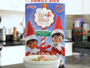 Box of Kellogg's The Elf on the Shelf Cereal on a counter with a bowl in front of it